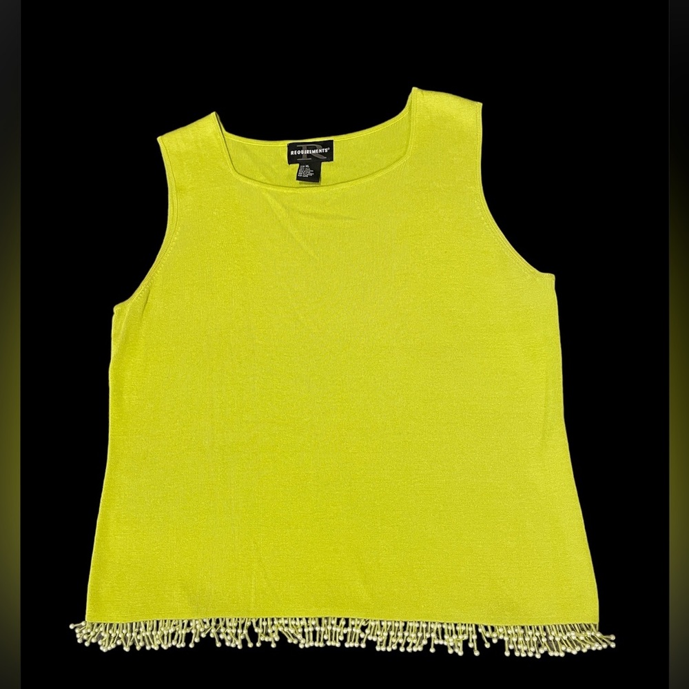 Gorgeous green sleeveless shirt with beads on the bottom.